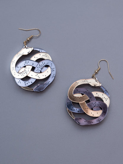 Pendientes de metacrilato tipo gancho en dorado, inspirados en la historia interminable. Hecho a mano con metacrilatos espejo dorado y antracita. 