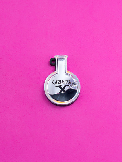 Charms/pendientes de metacrilato inspirados la sustancia X que creó a las Supernenas. Con espejo iridiscente.