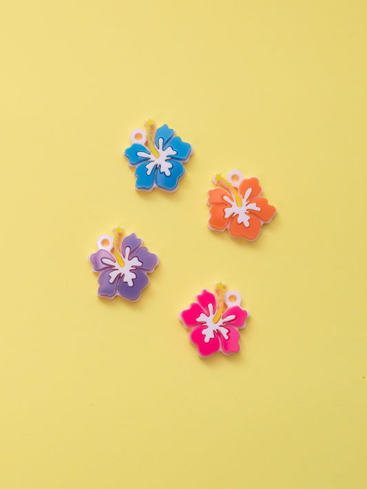 Flor de hibisco hawaiana inspirada en Lilo y Stitch. De colores azul,morado,fucsia y naranja. Aros en acero inoxidable 
