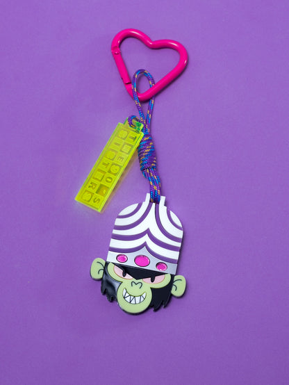 Maxillavero inspirado en Mojo Jojo el villano principal de Las Supernenas. Con mosqueton de corazón para colgarlo en tus bolsos o donde quieras