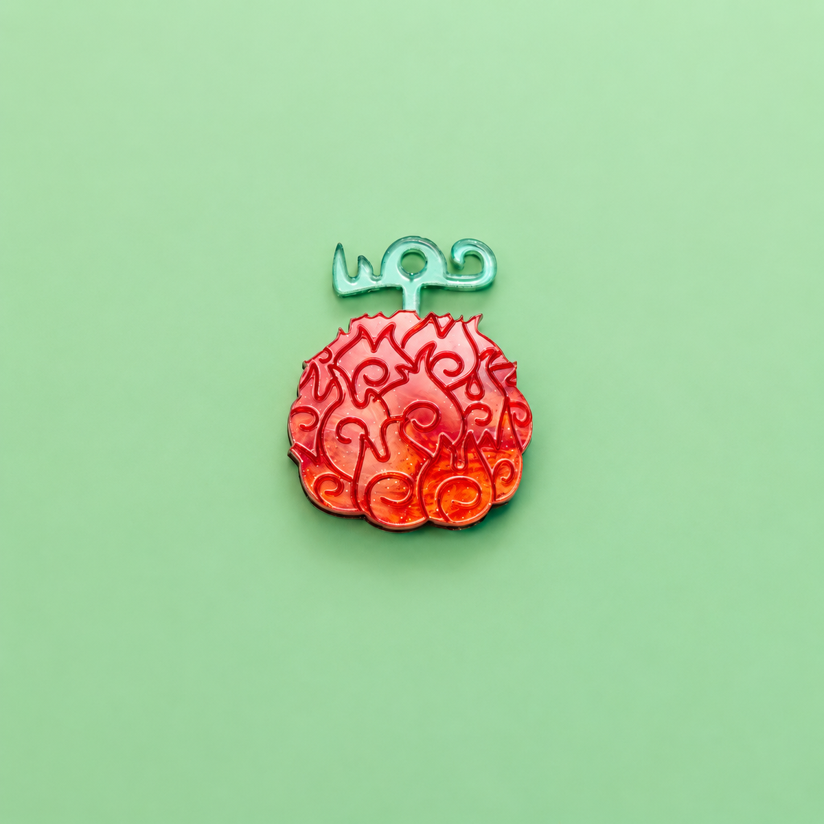 Pendientes inspirados en tu anime favorito, Nueces de belcebu o frutas del diablo hechas de metacrilato de diferentes colores, en este caso naranja aguas y espejo verde. Mera mera no mi