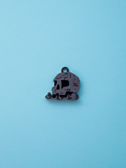 Pack de pendientes de metacrilato inspirados en peter pan: La isla calavera, en metacrilato efecto piedra 